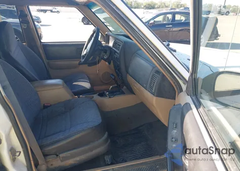 2000 Jeep Cherokee Sport from USA, damaged, VIN 1J4FF48S6YL247663